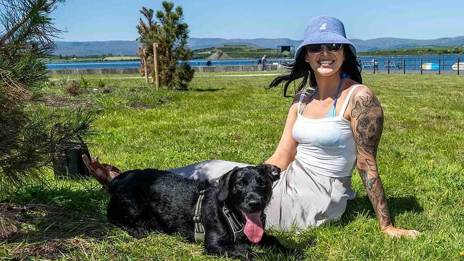 Making the most of the hot and sunny day in Bantry was Lauren Miller from Bandon with her dog 'Stanley'. Picture: Andy Gibson.