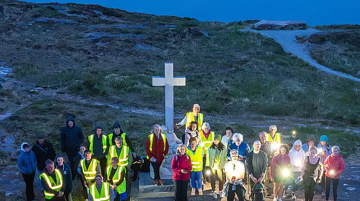 Some of the participants in the recent Darkness Into Light walk in Kilcrohane seen on top of the Goat's Path at daybreak. Photo courtesy of Donal O'Connell.