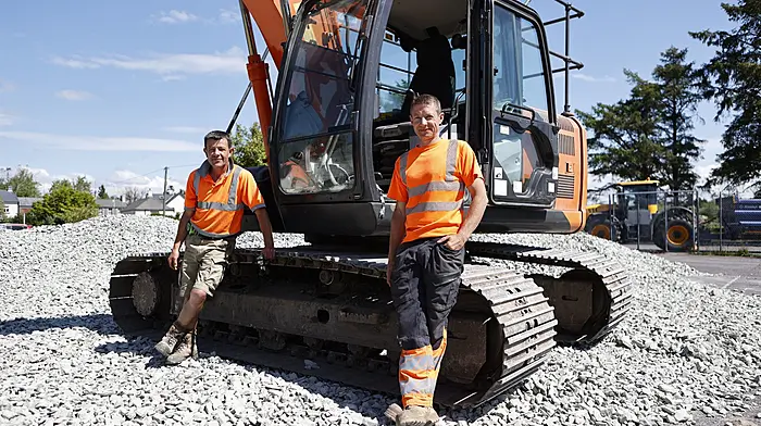 Tom Keavney and Stephen O’Brien from Plant Hire Ltd working at the tennis courts in Ballydehob.  (Photo: Carlos Benlayo)