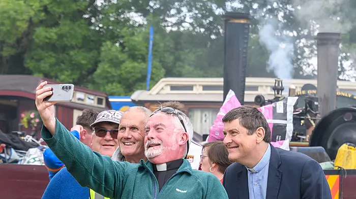 Rev Andrew Coleman OLM taking a selfie with Canon Denis MacCarthy, Aidan Holland of Clonakilty, and Rev Jeremy Nicholls at the Innishannon Steam & Vintage Rally. (Photo: David Patterson)