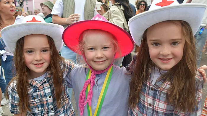 Ella and Ava Hurley, Schull and Grace Howard Hegarty, Lisheen, enjoying the tunes in Ballydehob. Astrid Quin from Kinsale having fun on the amusments at the Belgooly ag show. (Photos: Anne Minihane & David Creedon)