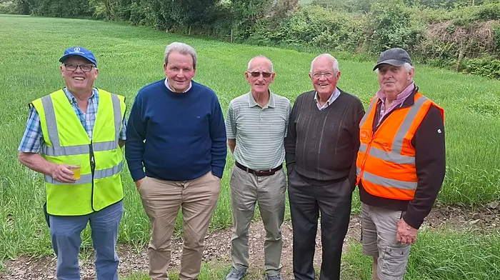 Club members Jerry O'Flynn, Liam Deasy, Richard O'Flynn, Jerry O'Leary and Ned O'Flynn at Castleview Pitch last Sunday during the GAA walk to every pitch on which the Ballinascarthy teams trained and played on, as part of the club’s 80th anniversary celebrations. In all, 18 pitches were visited over a 12 mile distance and flags were placed at each pitch and a photo captured of the landowner.