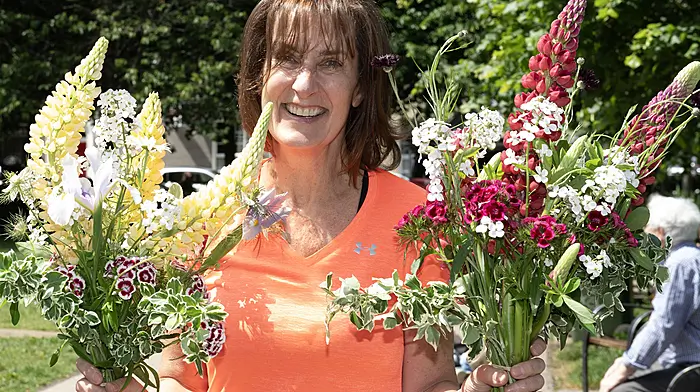 Helen Scully from Ardfield saying it with flowers in Kennedy Gardens, Clonakilty.    (Photo: Martin Walsh)