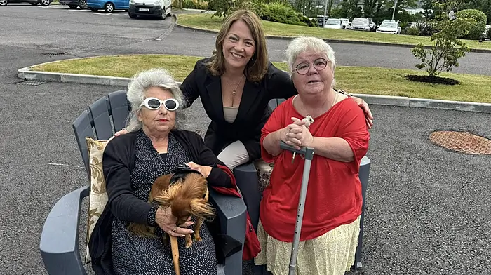 Cllr Caroline Cronin chatting with two well-known Schull residents, Mary Waldron (left) and Pauline Cotter at the official opening of the new community housing project, Ard na Mara.