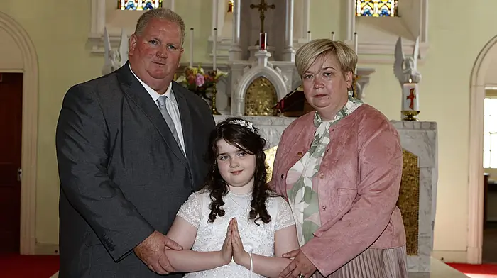 Brian and Maria O'Sullivan with their daughter Saoirse on the occasion of her First Holy Communion in Goleen church last Sunday. (Photo: Carlos Benlayo)