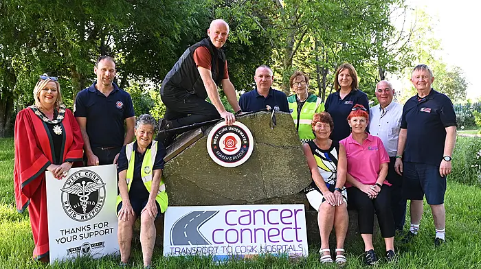 Clonakilty's John Callaghan will begin his climb of Mount Kilimanjaro on July 21st to raise funds for three West Cork charities; Cancer Connect, West Cork Rapid Response and West Cork Underwater Search and Rescue. Standing: Eileen Sheppard (mayor of Clonakilty), Eamonn Barry (West Cork Underwater Search and Rescue),  John Callaghan (climber), Liam Slattery (WCRR), Betty Hennessy (WCRR),  Helen O'Driscoll (manager, Cancer Connect),  Christy Dempsey (Cancer Connect) and Jim Murphy (Cancer Connect).  Seated: Dena O'Donovan (WCRR), Catherine Callaghan (John's wife) and Sinead Crowley (Cancer Connect.) (Photo: Martin Walsh)