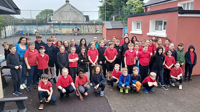 First and sixth class pupils of Carrigboy National School with Olympic athlete Phil Healy when she visited the school last Monday.
