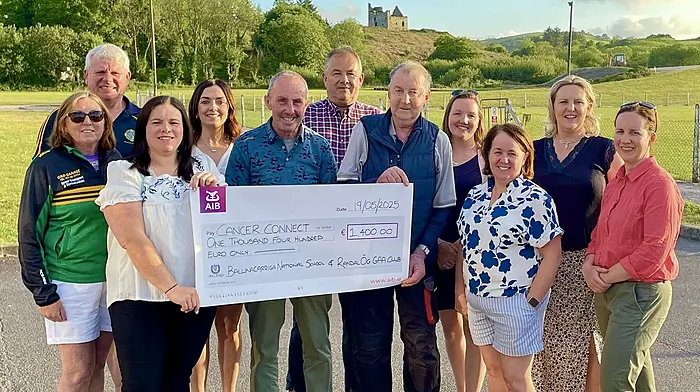 Ballinacarriga National School and Randal Óg GAA presented Cancer Connect with a cheque for €1,400 from the proceeds of their recent tractor run. Pat White and Sean O'Donovan collected the cheque on behalf of Cancer Connect. The organisers thanked all of those who helped run the event, those who sponsored raffle prizes and everyone who supported and came along on the day. Back: Frank O'Donnell, Geraldine Hurley, Dan O'Sullivan, Charlotte Dewar and Ruth McSweeney. Front: Lynn Holland, Laura Burchill, Sean O'Donovan, Pat White, Mary O'Donnell and Catriona Hennessy.