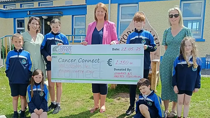 Aoife O’Driscoll and Sharon McCarthy, along with students from Lisavaird National School, presenting a donation of €1,250 to Helen O’Driscoll of Cancer Connect. The donation was raised by the parents association from the recently held Rosemary Calnan tractor run. Pupils include, standing: Harry McCarthy, Isla O’Keeffe, Orlaith Duggan, Mathew Calnan, Sharon McCarthy and Ella-Mae White Slattery. Front: Edward Horgan and Aoife O’Driscoll.