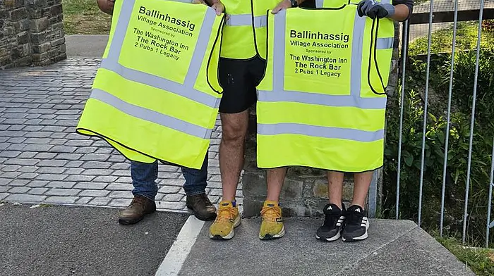 Paul O'Rourke from The Rock Bar and Washington Inn, who sponsored the high vis vests for the Ballinhassig Tidy Village Association, with Derry Finn and Charlie Kavanagh.