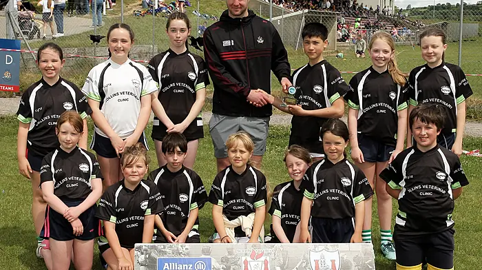 Roinn 10 Mixed runners-up Kilcoe NS with Cork footballer Maurice Shanley. (Photo: Paddy Feen)