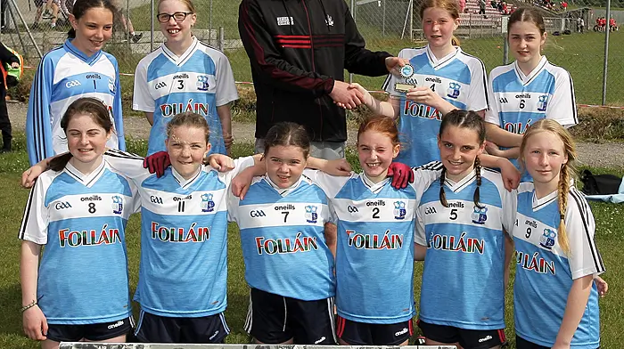 Roinn 5 Girls runners-up Scoil Chúil Aodha - Barr d'Inse with Cork footballer Maurice Shanley. (Photo: Paddy Feen)