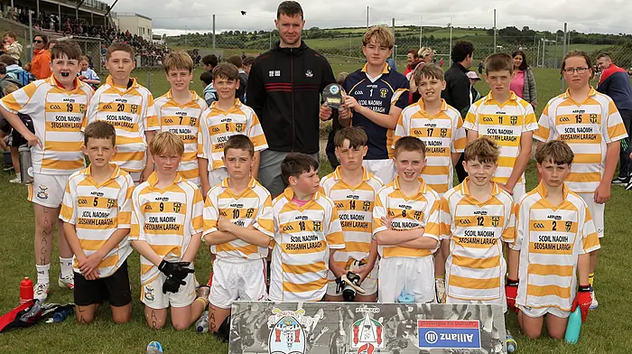 Roinn 2 Boys runners-up Laragh NS with Cork footballer Maurice Shanley. (Photo: Paddy Feen)