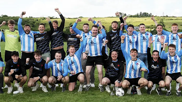 The Baltimore FC team celebrates after being confirmed winners of the O'Brien Water Services.com Championship. (Photo: Paddy Feen)