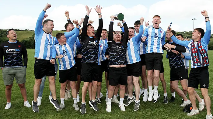 The Baltimore FC team celebrates with the O'Brien Water Srvices.com Championship Cup.