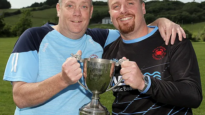 Team manager Sean McCarthy and Kieran Lynch with the O'Brien Water Services.com Championship Cup. (Photo: Paddy Feen)