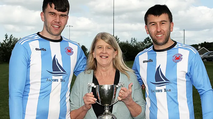 Alan and John Davis with their mother Caroline. (Photo: Paddy Feen)