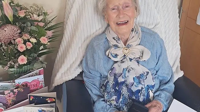 Delia O'Sullivan from Glengarriff who was born in Rossmacowen, Beara, recently celebrated her 101st birthday at Castletownbere Community Hospital surrounded by her loving family and staff members. Delia is holding the letter and medal she received from the president to commentate the fantastic milestone.