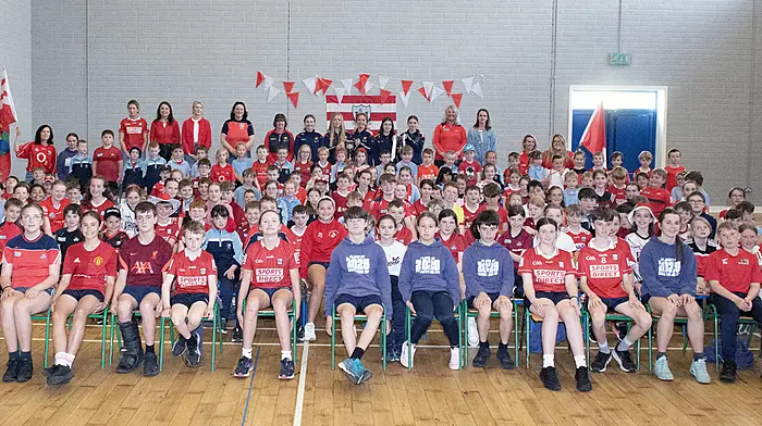 Teaching staff and pupils of Baryroe National School welcomed the Ibane members of the Cork LGFA team that won the All-Ireland U14 platinum final that included Kate Collins, Niamh Doyle, Aoife Harte, Aoife Walsh, Aibhlin McCarthy and their coach Mary Harrington.  (Photo: Martin Walsh)