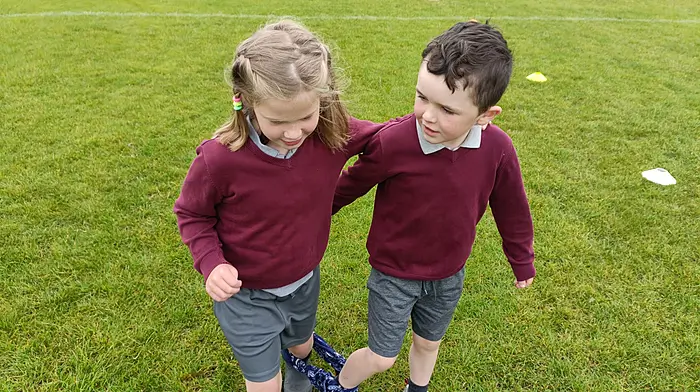 Emma Flynn and Jonathan Holland taking part in the three-legged race at the parish sports day which was organised by Dromore National School and which included the three schools in the parish; Dromore, Caheragh and Dreeny National Schools.
