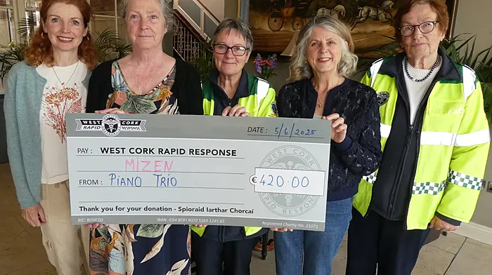 The Mizen Piano Trio presented €420, the proceeds of their recent concert, to West Cork Rapid Response. From left: Nora Killeen (violin), Susan Nares (piano), Kate Crowley (WCRR), Diana Llewellyn (cello) and Betty Hennessy (WCRR).
