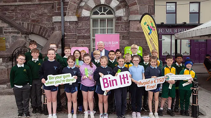 Pupils from St Joseph's Primary School and St Colman's Boys National School in Macroom with deputy county mayor Cllr Martin Coughlan, the Gum Litter Taskforce (GLT), Cork County Council and Macroom Tidy Towns, who all took to the streets of Macroom this week to demonstrate the proper means of gum disposal and raise awareness of the environmental and fiscal impacts of gum litter.   (Photo: Diane Cusack)