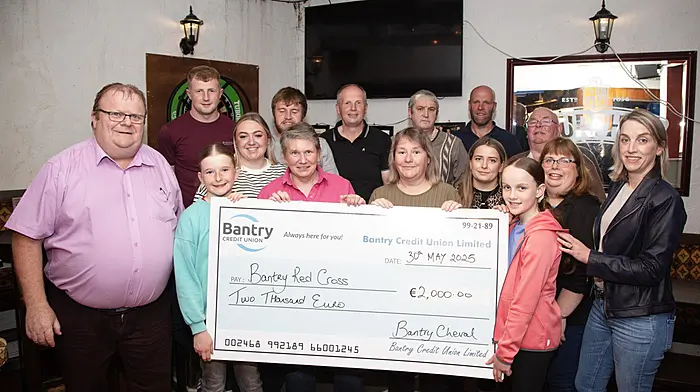 Anna Connolly (left) and Anna O Donovan (right) presenting a cheque of €2,000 to Bantry Red Cross members Lucinda Ross and Claire Mackey, the proceeds raised at the recently held Bantry Cheval. Also included are members of the Bantry and the West Cork Cheval committees.