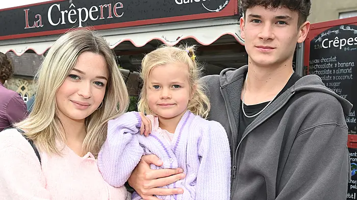 Iwen (left) and Zoe Haida from Clonakilty with Leon Kalinowski at La Creperie durinfg the Friday Market in Kennedy Gardens.   (Photo: Martin Walsh)