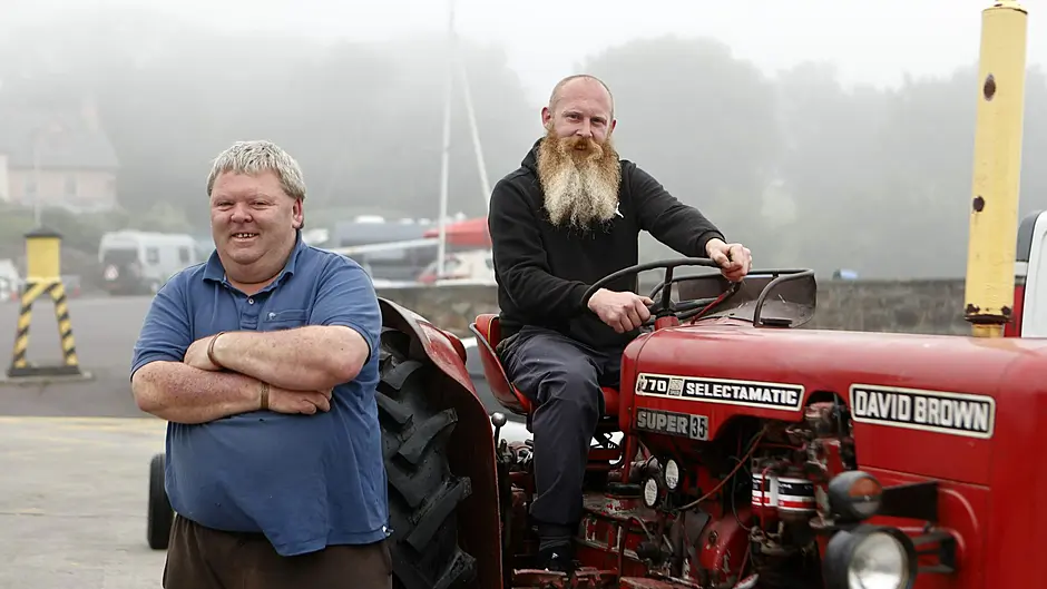 William and David Jones at Schull Pier after unloading the boat. (Photo: Carlos Benlayo)