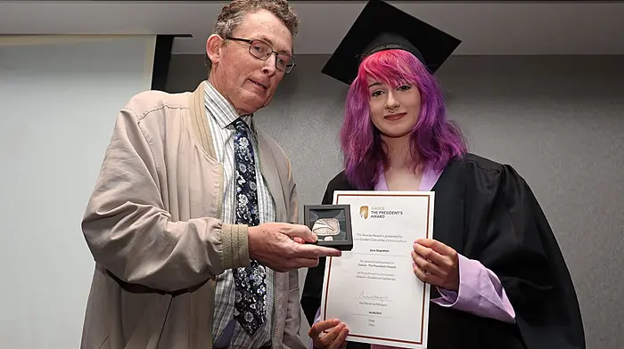 REPRO FREE.19/06/2025.Pictured is Gerard Griffin, National Co-ordinator at Youthreach, presenting Zero Stapleton, Ballincollig Youthreach Centre, with her Gaisce Presidents Award, at the Cork College of FET's Youthreach Programme (Cork ETB's Cork College of Further Education & Training), annual graduation ceremony, at the Talbot Hotel Cork, Ballincollig, Cork.Picture: Jim Coughlan.