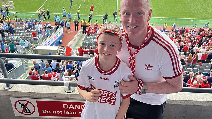 Donal O'Sullivan, from Dunmanway, and his son Oisín supporting Cork in GAA HQ.