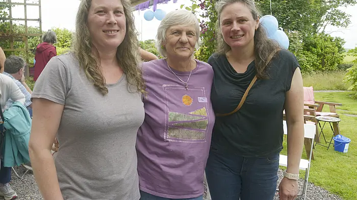 NEWS 29/6/2025 Pictured at an open garden family day fundraiser at Pinetree Lodge Garden and Gallery was Lena O'Connell, Erika Sexton and Claudia Graepel. Picture Denis Boyle