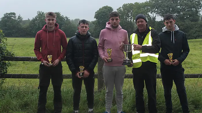 Shane Crowley, Carbery U18 champion, receiving the cup from referee Denis Murphy, Marsh Road Committee. From left: Niall O’Driscoll (semi-finalist), Sean Cuinnea (final runner-up), Shane Crowley (winner) and Eoin Crowley (semi-finalist)