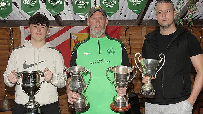 Clonakilty Soccer Club team joint-manager John Leahy with his sons Logan and Jonathan.