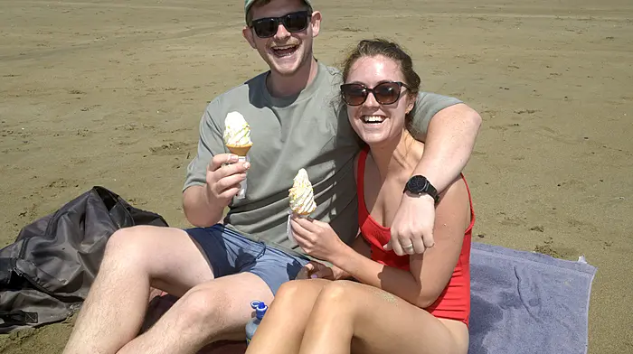 NEWS 11/7/2025 Pictured celebrating their engagement at the beach at Garretstown Co Cork was Luke Holland from Ballinadee with Trish Donovan from Barryroe. Picture Denis Boyle