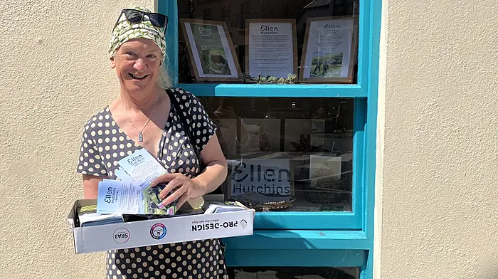 Clare Heardman out and about on a sunny day delivering flyers to promote the upcoming Ellen Hutchins Festival, which will be held from August 16th to 24th. Thanks was expressed to the Bantry Credit Union for the wonderful display in the window which showcases the festival.