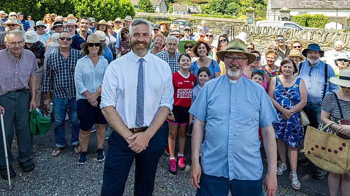 Minister Christopher O’Sullivan with Dean Cliff Jeffers and a large crowd at the annual Rosscarbery Union of Parishes garden fete which was held last  Saturday.
