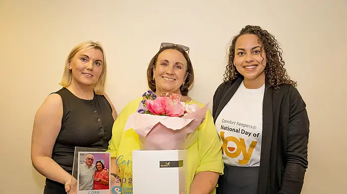 At the Comfort Keepers National Day of Joy are Tippula Mangan (branch manager Cork), Carrigaline's Irene O’Neill (regional winner of this year’s Comfort Keepers Carer of the Year award), and Connie Nolan (area manager Cork)