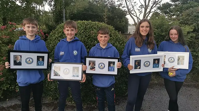 At their graduation mass with their photo frames and sliotars presented to them from the Clogagh National School’s parents association are Conor Cashman, Ryan Deasy, Harry O'Reilly, Ayla Bishop and Neasa Kiernan. Thanks was expressed to Fr John for a lovely mass and the national school leavers are wished all the best in their next chapter.