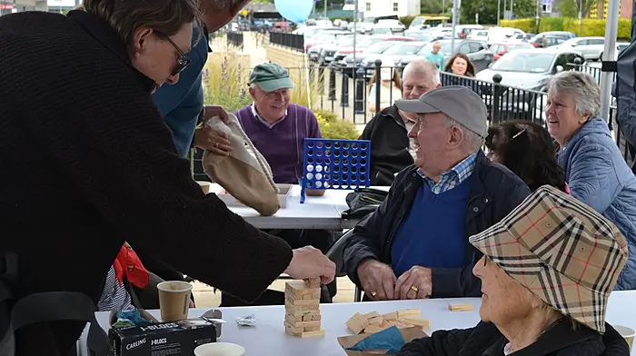 The recently held Age Friendly Party on the square was enjoyed by all those who attended. The event was organised as a celebration of older age and life and featured live music, dance and fun. Live music was provided by 4 Ukes Sake ukulele band, John Cotter, Fergal Conlon, children from St Brendan’s NS, and ballads by Peter Pallas. Many took the opportunity to do some old time waltzing. Free teas and coffees and treats from Diarmaid Murphy’s coffee truck were very popular. The local HSE Primary Care Team provided free health checks and the rain held off long enough to allow everyone to have a great outing.