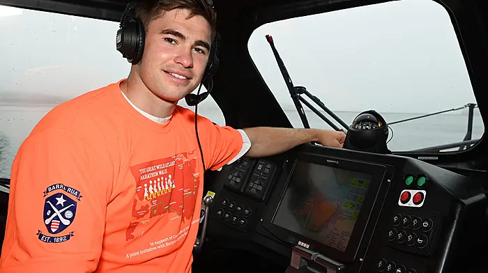 Munster and Ireland rugby star Jack Crowley, who is a familiar visitor to the Courtmacsherry area, at the photo-shoot for this year's Great Wild Atlantic Marathon Walk in aid of the Courtmacsherry RNLI and which will take place on Sunday August 24th.  (Photo: Martin Walsh)