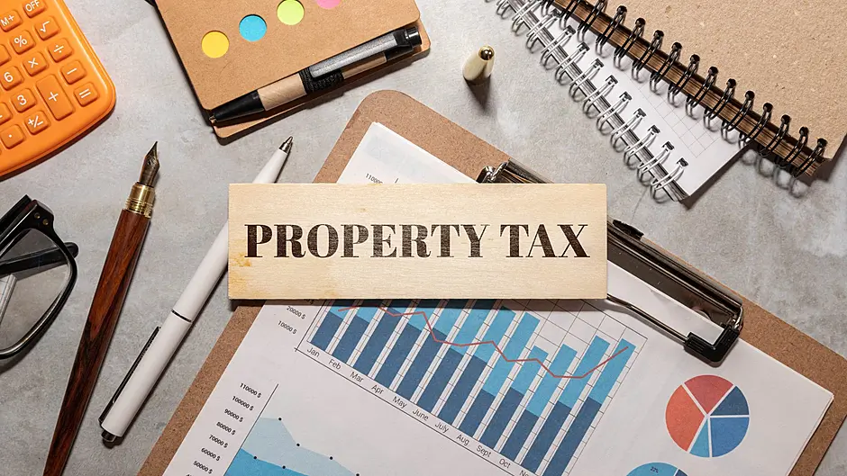 Property tax hike a blow for home owners Image
