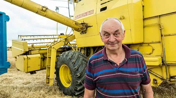 James Swanton from Bantry with his 1972 New Holland 1545 combine harvester at The West Cork Vintage Ploughing & Threshing Association's day last Sunday.  (Photo: Andy Gibson)