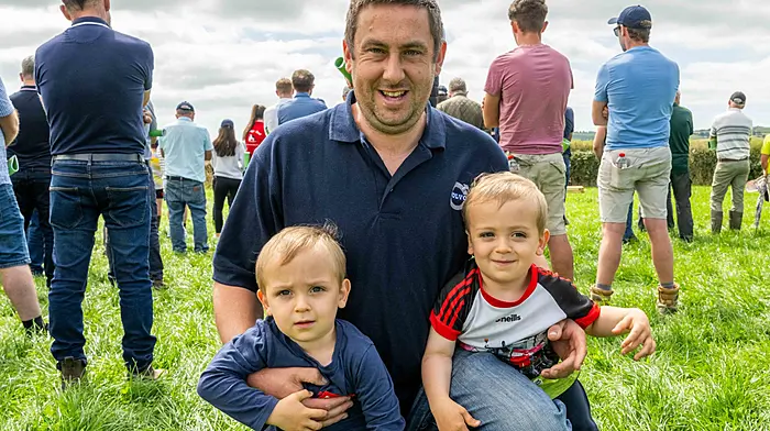 REPRO-FREE: Carbery Group Milk Quality Farm Walk 2025. Ballinadee, West Cork, Ireland. 25th Jul, 2025. Members of the board of Carbery Group met the Minister of Agriculture, Martin Heydon and the Minister for Biodiversity, Christopher O'Sullivan at a farm walk on the farm of Glenn Forde and family, Ballinadee on Friday last. The farming derogation was the main topic of discussion, with local farmers addressing their concerns to the ministers. At the event were Colm, William and Shane O'Neill from Ballinadee. Picture: Andy Gibson.