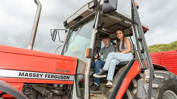 Adrian Collins (Ballineen) and Eabha Kehilly (Dunmanway) were drawing silage with a Massey Ferguson 3120 at the West Cork Vintage Ploughing & Threshing Association’s vintage harvest day at The Pike, Clonakilty. Proceeds from the event will go to Down Syndrome Cork, Field Of Dreams, Marymount Hospice, Bandon AFC and GAA All-Stars.  (Photo: David Patterson)