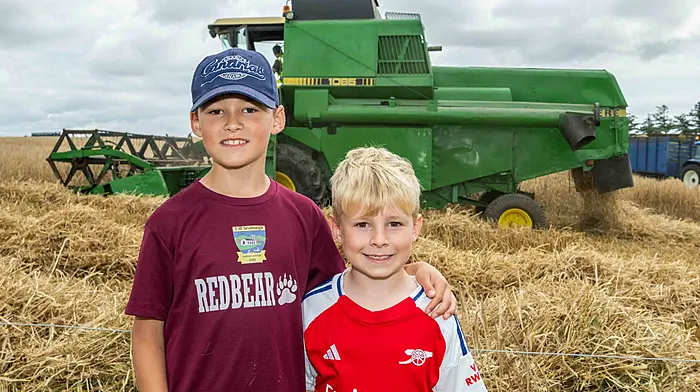 James and Dylan Egan (Clonakilty) enjoying a day out at the West Cork Vintage Ploughing & Threshing Association’s annual vintage harvest day which was held last Sunday.  (Photo: Andy Gibson)