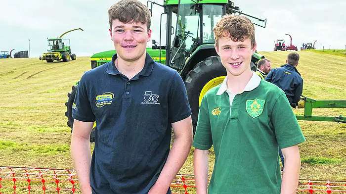 Eoin McCarthy (Kilbrittain) and Sean Fitzgerald (Lislevane) enjoying the vintage harvest day in Clonakilty last Sunday which was hosted by the West Cork Vintage Ploughing & Threshing Association.  (Photo: Andy Gibson)