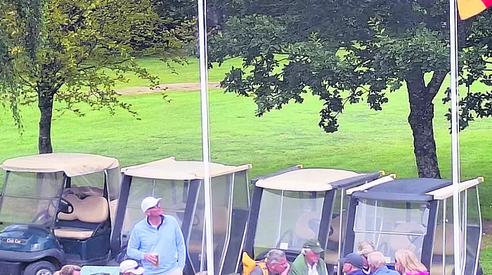 Some members of the German golfing party enjoyed a post-round drink after a challenging round on the course at Castlebernard.  Three flags were flown on the day, the Tricolour, the European flag and the German national flag.