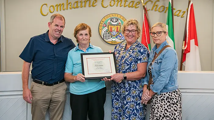 Niall O'Mahony, Lily Shorten and Denise Twohig from Newcestown received a prize for the Anti-Litter Challenge from Cllr Marie O’Sullivan at the Villages Divisional awards in Clonakilty.