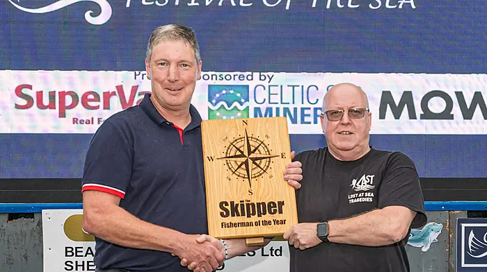 Wiilliam Power Winner of the Skipper Fisherman of the year Competition at the Castletownbere Festival of the Sea. William Power is presented  his prize by editor ot The Skipper Niall Duffy Picture: Anne Marie Cronin Photography